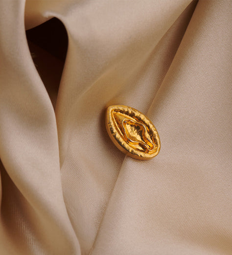 Close up of a custom Evangelista button