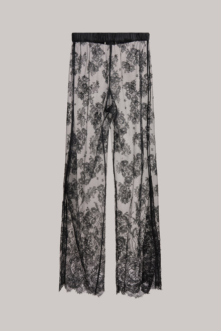 Black floral lace wide-leg pants with an elastic waistband, shown flat against a solid light gray background.