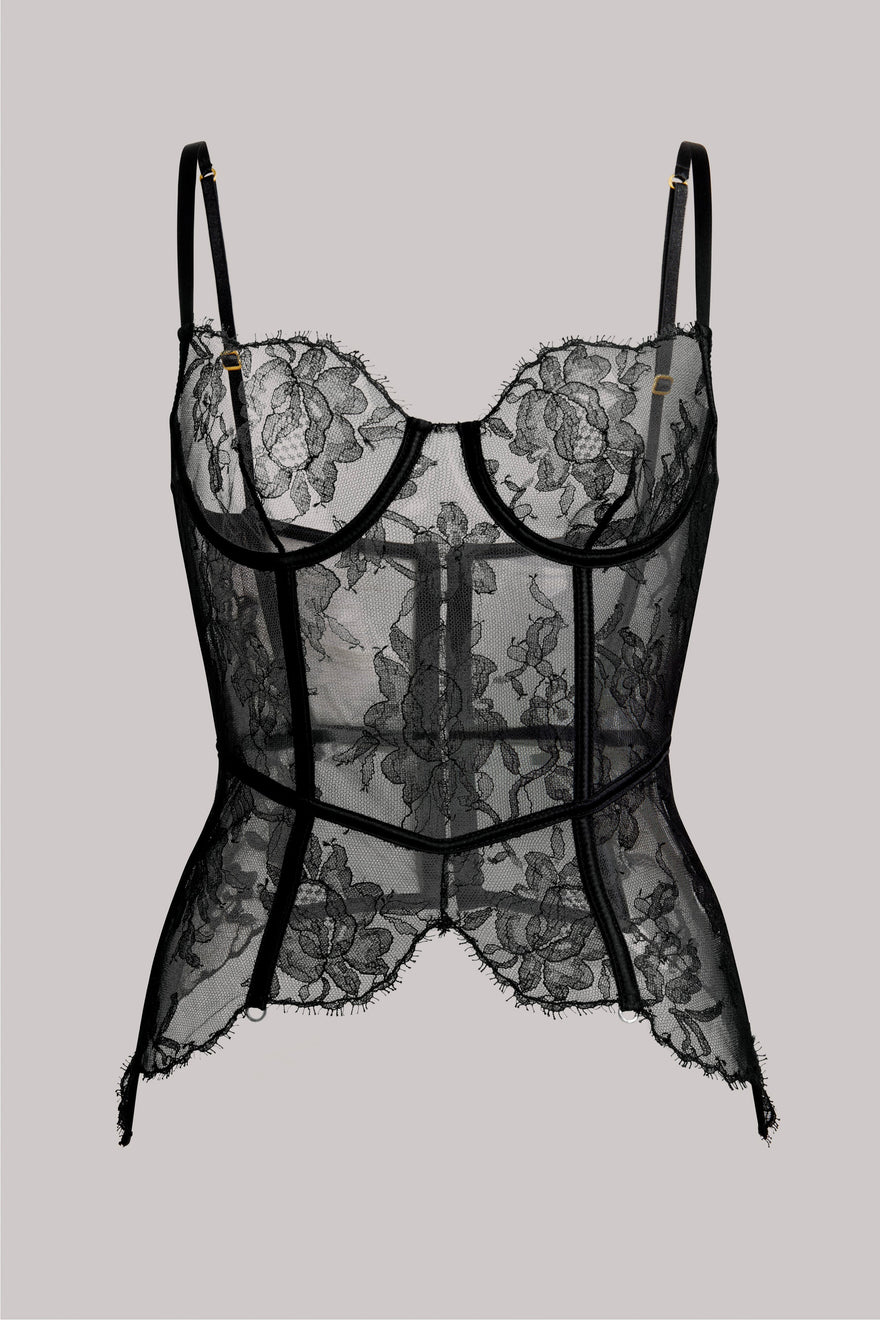 Black sheer floral lace corset-style lingerie top with thin shoulder straps and structured cups, shown flat against a light gray background.