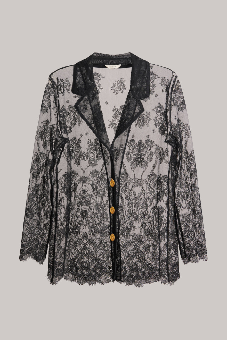 Black lace cardigan with gold buttons on a gray background