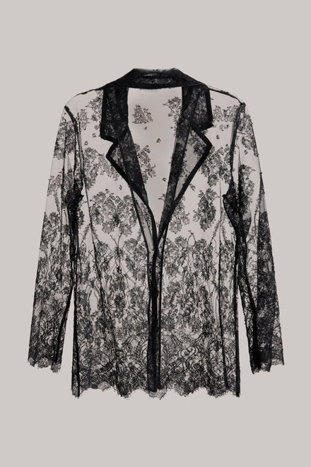 Black lace jacket on a light gray background