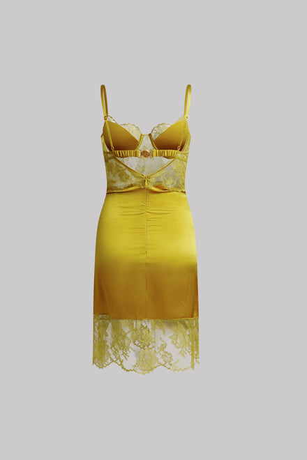 A yellow satin slip dress with a lace bralette top and matching lace hem, displayed against a solid gray background.